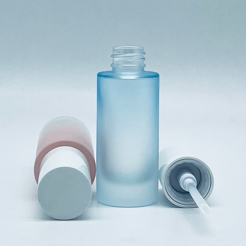 Luxury Cosmetic Packaging Cylinder Round Frosted Matte Pink Transparent Blue 30ml Lotion Glass Pump Bottle