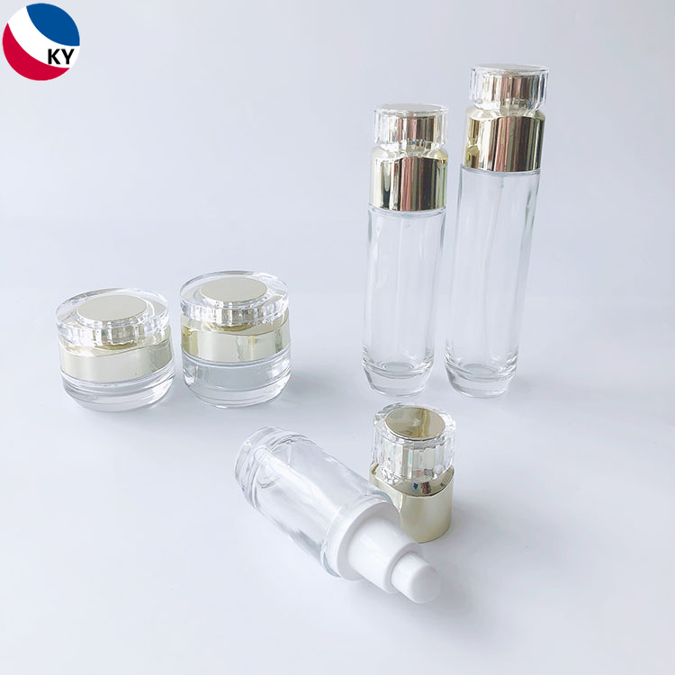 Luxury Cosmetic Packaging Sets Round Thick Bottom 30g 50g 30ml 50ml 100ml Cream Jar Clear Glass Pump Bottle with Gold Pump