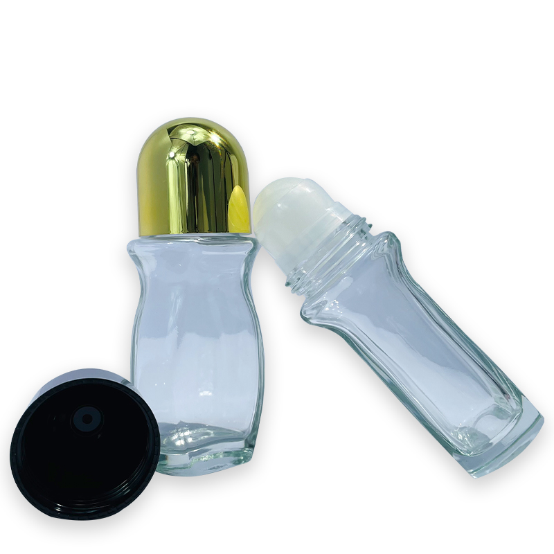 Unique Shape Transparent 30ml Glass Roll on Bottle Cosmetic Packaging Rose Gold Color Screw Cap 1oz Glass Roller Bottle